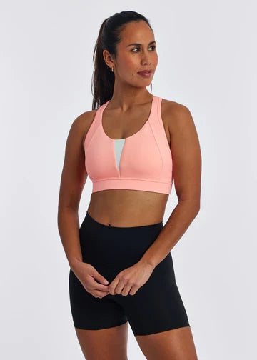 Women's Oiselle Double Breasted Bra in Fast Pink, front view.