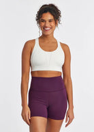 Women's Oiselle Double Breasted Bra in White, front view.