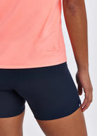 Women's Oiselle Essential Bird V Neck Short Sleeve. Pink. Fabric/logo closeup.