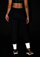 Women's Oiselle Fireglow Fleece Tights. Black.
