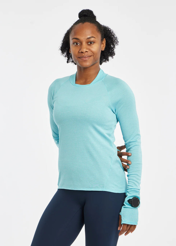 Women's Oiselle Flyout Wool Long Sleeve. Light Blue. Front view.