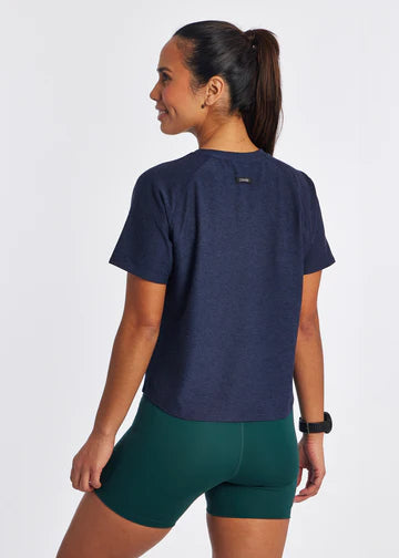 Women's Oiselle Lux Boxy Short Sleeve. Dark Blue. Rear view.