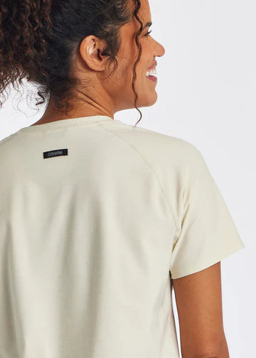 Women's Oiselle Lux Boxy Short Sleeve. Off White. Rear closeup.