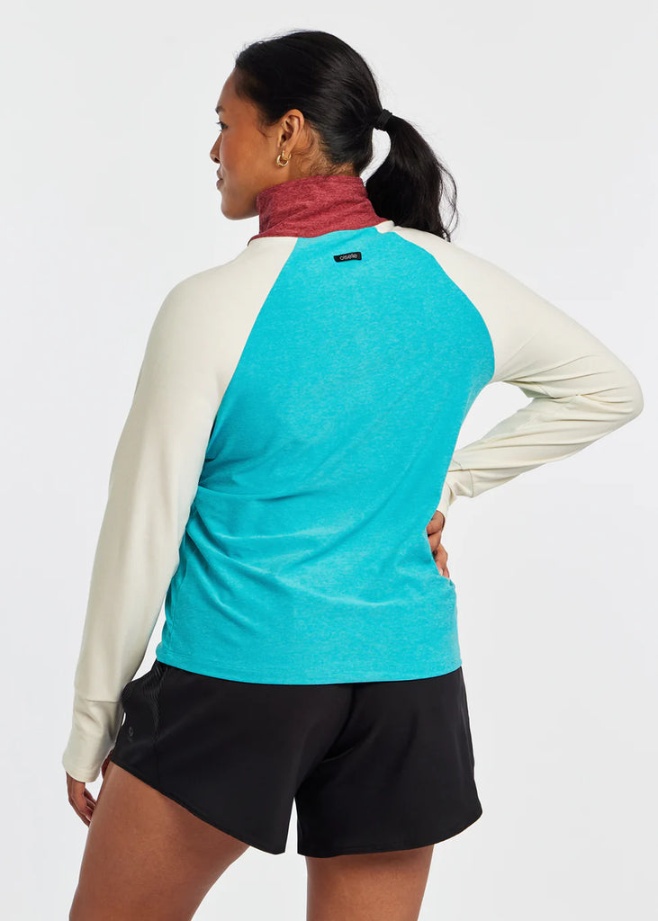 Women's Oiselle Lux Half Zip. Blue/White. Rear view.