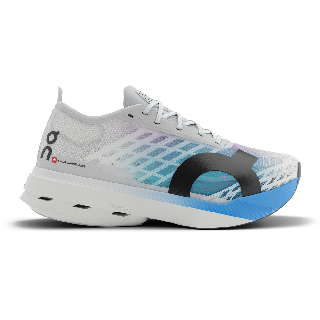 Women's On Cloudboom Strike. White upper. White/Blue midsole. Lateral view.