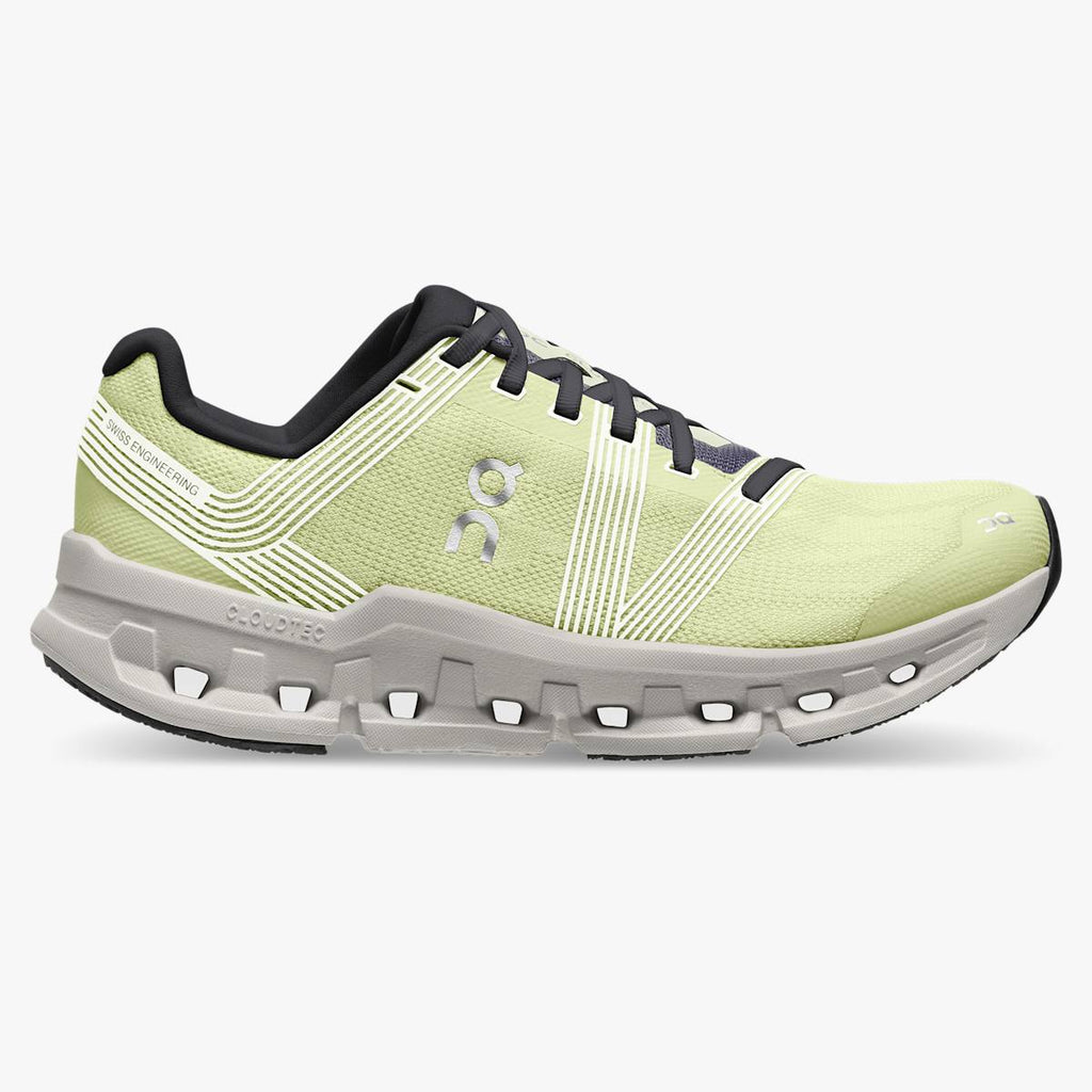 Women's On Cloudgo. Light Yellow upper. White midsole. Lateral view.