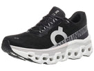 Women's On Cloudmonster 2. Black upper. White midsole. Lateral view.