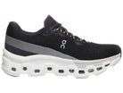 Women's On Cloudmonster 2. Black upper. White midsole. Medial view.