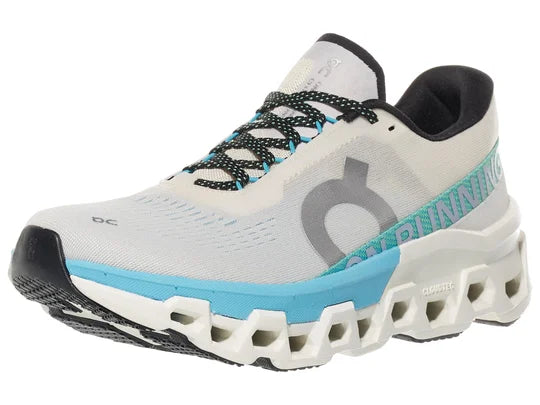 Women's On Cloudmonster 2. White upper. White midsole. Lateral view.