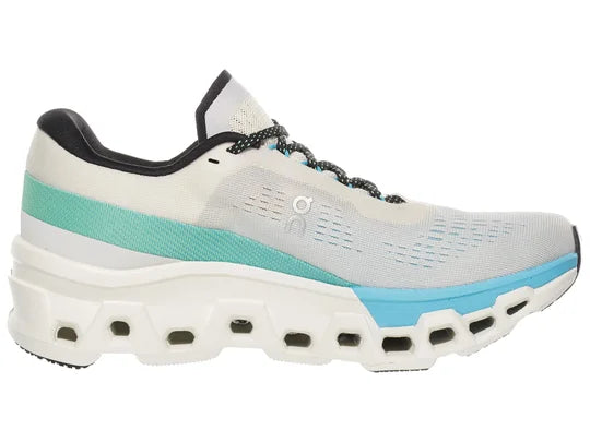 Women's On Cloudmonster 2. White upper. White midsole. Medial view.