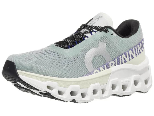 Women's On Cloudmonster 2. Light Grey upper. White midsole. Lateral view.