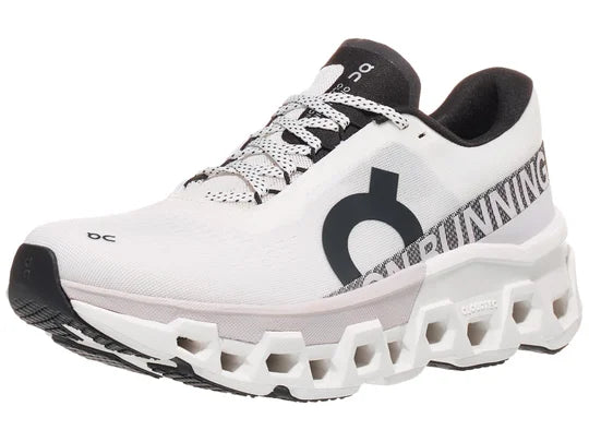 Women's On Cloudmonster 2. White upper. White midsole. Lateral view.