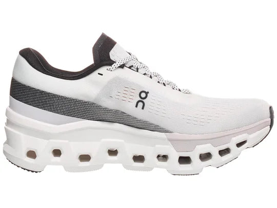 Women's On Cloudmonster 2. White upper. White midsole. Medial view.