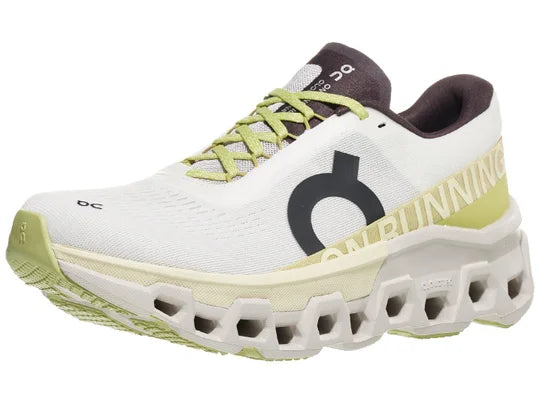 Women's On Cloudmonster 2. White upper. White midsole. Lateral view.