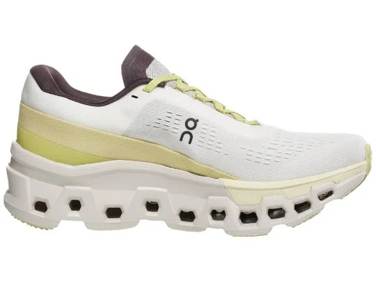 Women's On Cloudmonster 2. White upper. White midsole. Medial view.