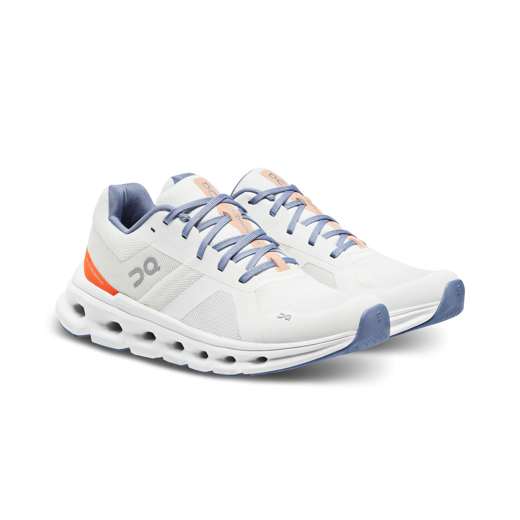 Women's On Cloudmonster. White upper. White midsole. Lateral view.