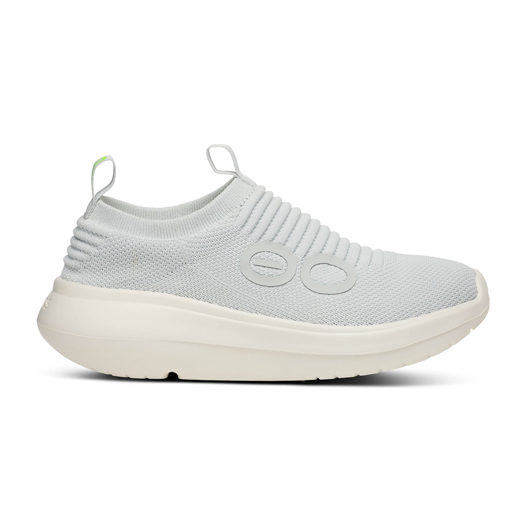 Women's Oofos Oomy Zen. White upper. White midsole. Lateral view.