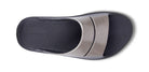 Oofos Ooahh Luxe Slide. Tan upper. Black midsole. Top view.