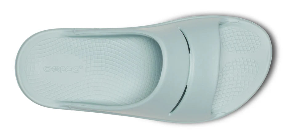 Oofos Ooahh Slide. Light Blue. Top view.