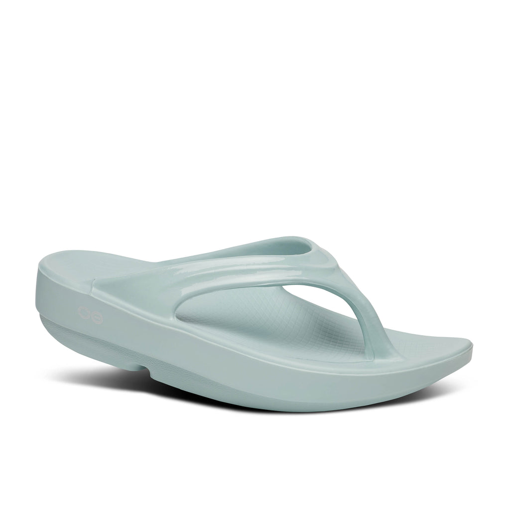 Women's Oofos Oolala Thong. Light blue. Lateral view.