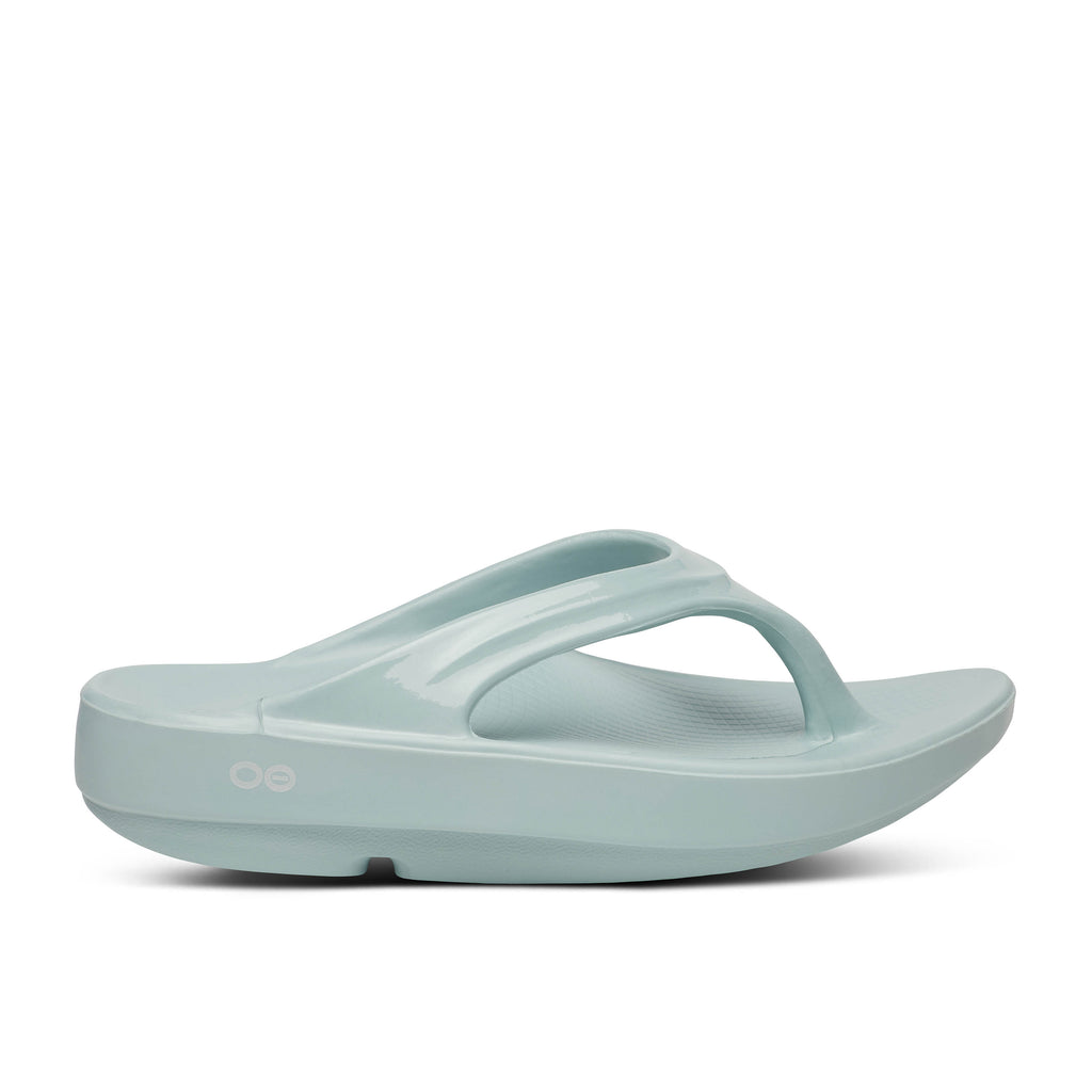 Women's Oofos Oolala Thong. Light blue. Lateral view.