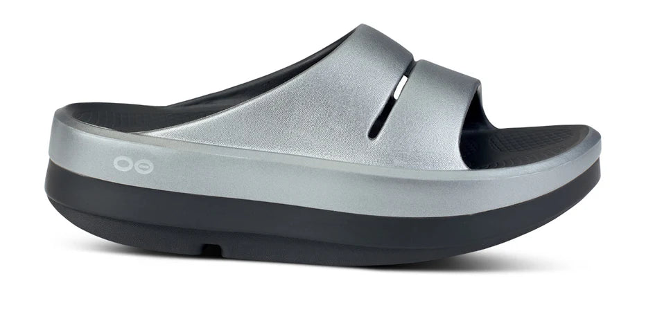 Women's Oofos OOmega Ooahh Sandal. Grey upper. Black midsole. Lateral view.