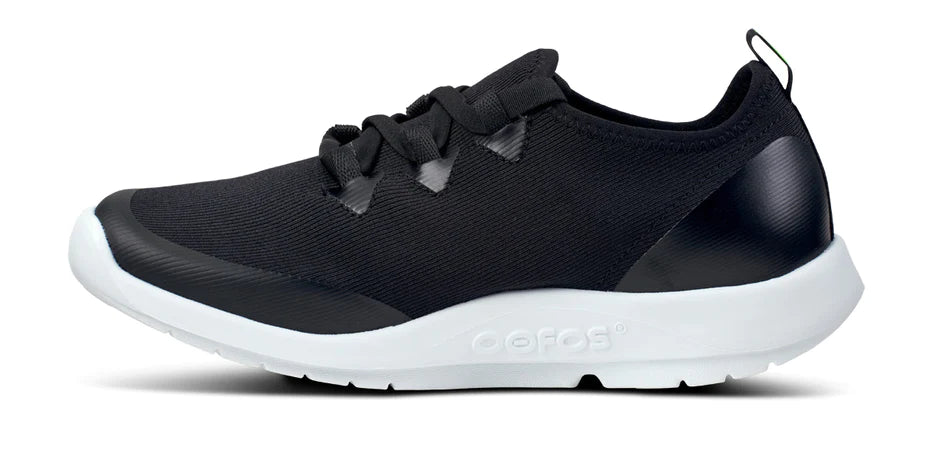 Oofos OOmg Sport LS Shoe. Black upper. White midsole. Medial view.
