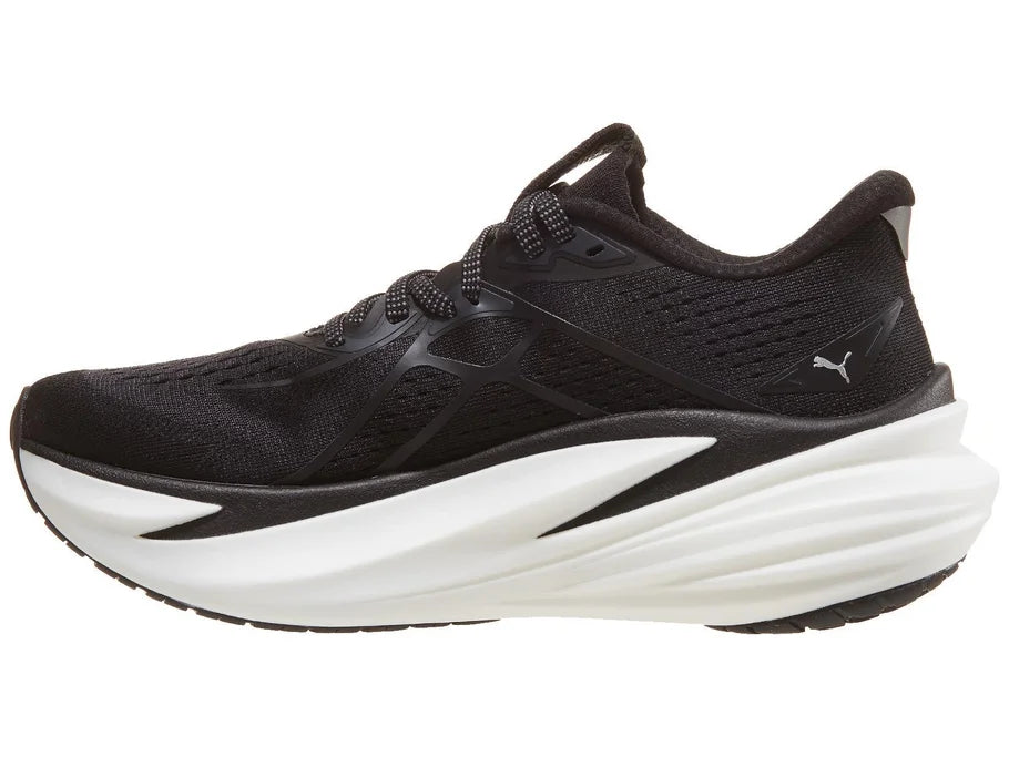 Women's PUMA MagMax Nitro 2. Black upper. White midsole. Medial view.