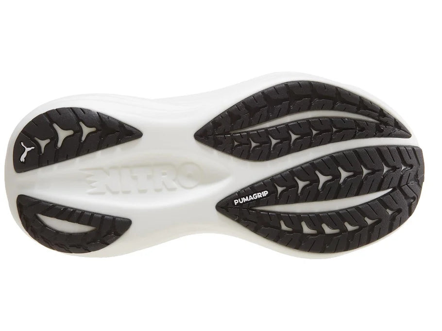 Women's PUMA MagMax Nitro 2. Black upper. White midsole. Bottom view.
