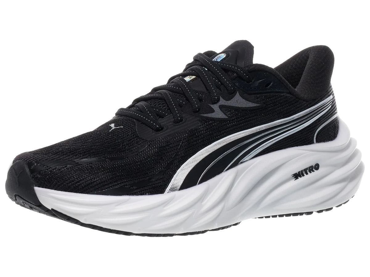 Women's Puma Velocity Nitro 4. Black upper. White midsole. Lateral view.