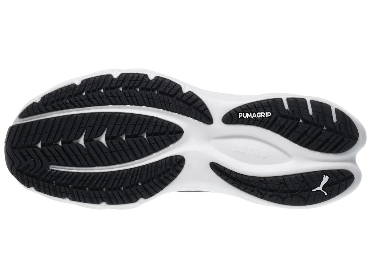 Women's Puma Velocity Nitro 4. Black upper. White midsole. Bottom view.