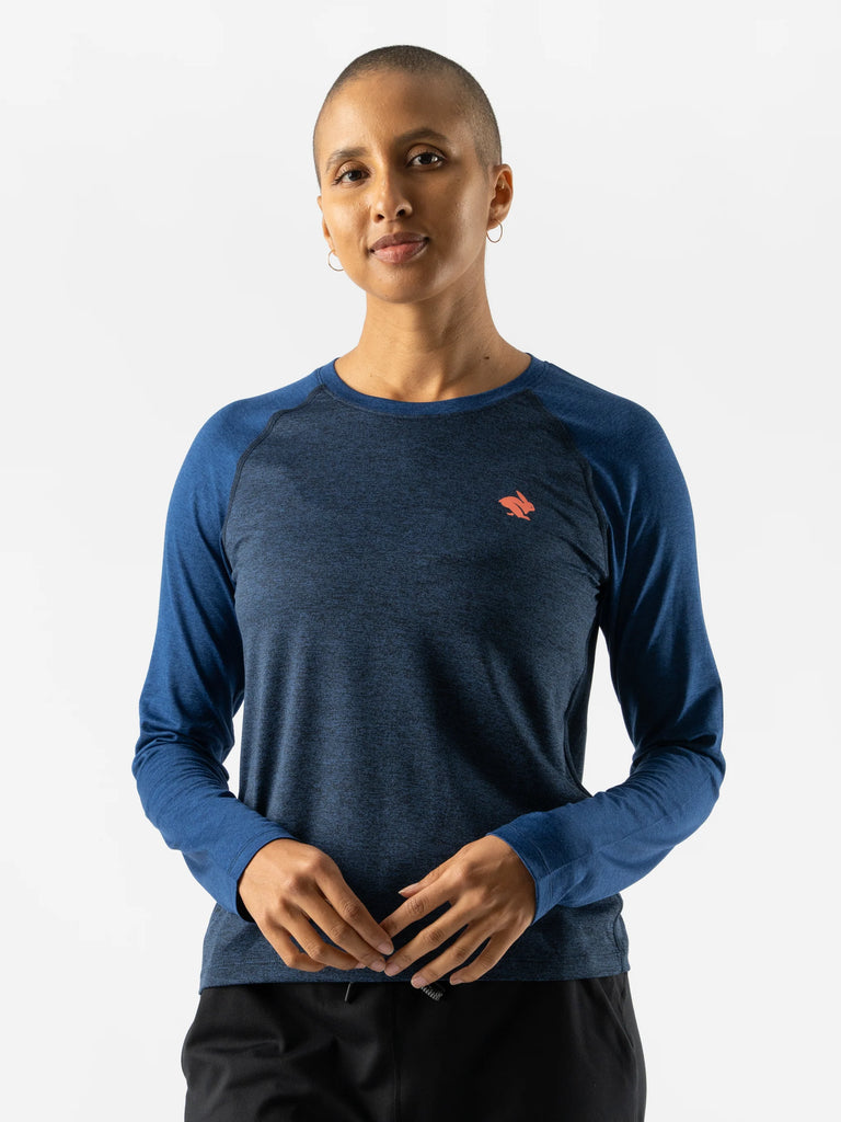 Women's rabbit EZ long sleeve cropped. Dark Blue. Front view.