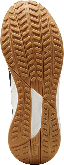 Women's Reebok Floatride Energy Grow. White upper. White midsole. Bottom view.
