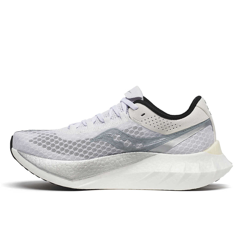 Women's Saucony Endorphin Pro 4. White upper. White midsole. Medial view.