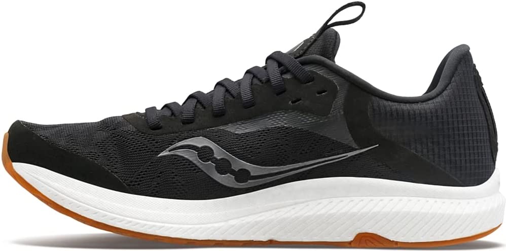 Women's Saucony Freedom 5. Black upper. White midsole. Medial view.