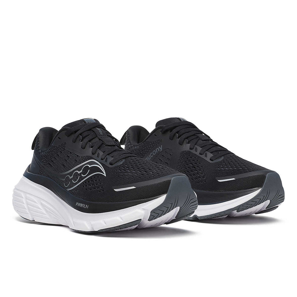 Women's Saucony Guide 18. Black upper. White midsole. Lateral view.
