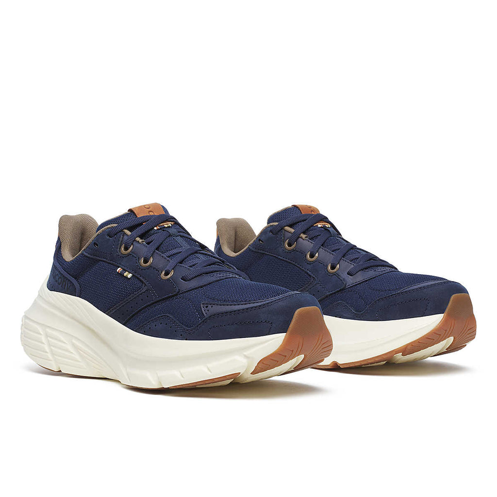 Women's Saucony Guide Metro. Navy upper. White midsole. Angled Lateral view.