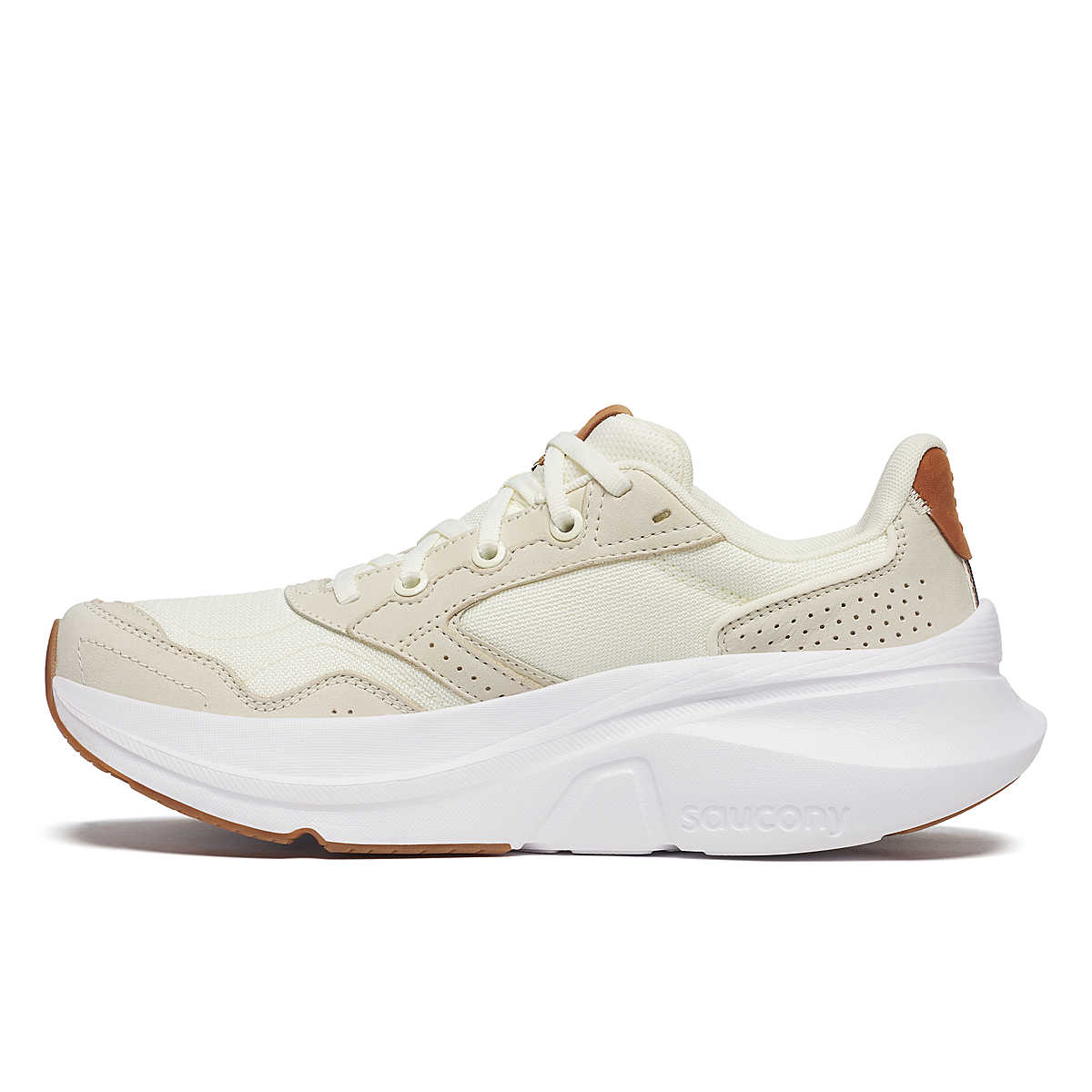 Women's Saucony Guide Metro. Beige upper. White midsole. Medial view.