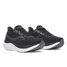 Women's Saucony Triumph 23. Black/White. Lateral view.