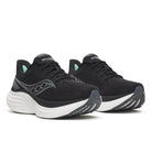 Women's Saucony Triumph 24. Black upper. White midsole. Lateral view.