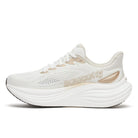 Women's Saucony Triumph 24. Off White upper. White midsole. Medial view.