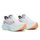 Women's Saucony Triumph 24. White upper. Light Green midsole. Lateral view.