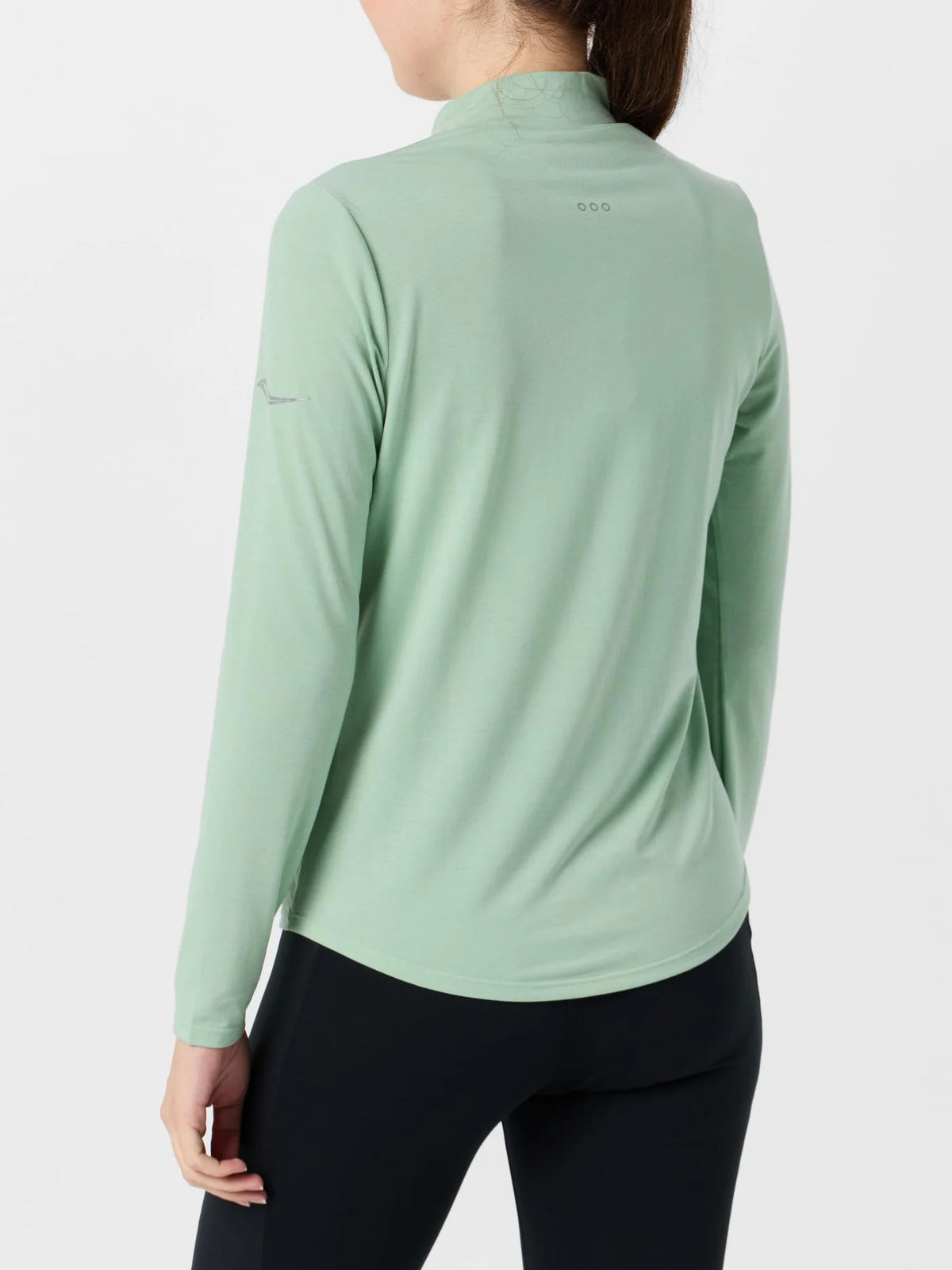 Women's Saucony Triumph Long Sleeve. Light green. Back view.