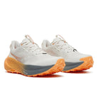 Women's Saucony Xodus Ultra 4. White upper. Orange midsole. Lateral view.