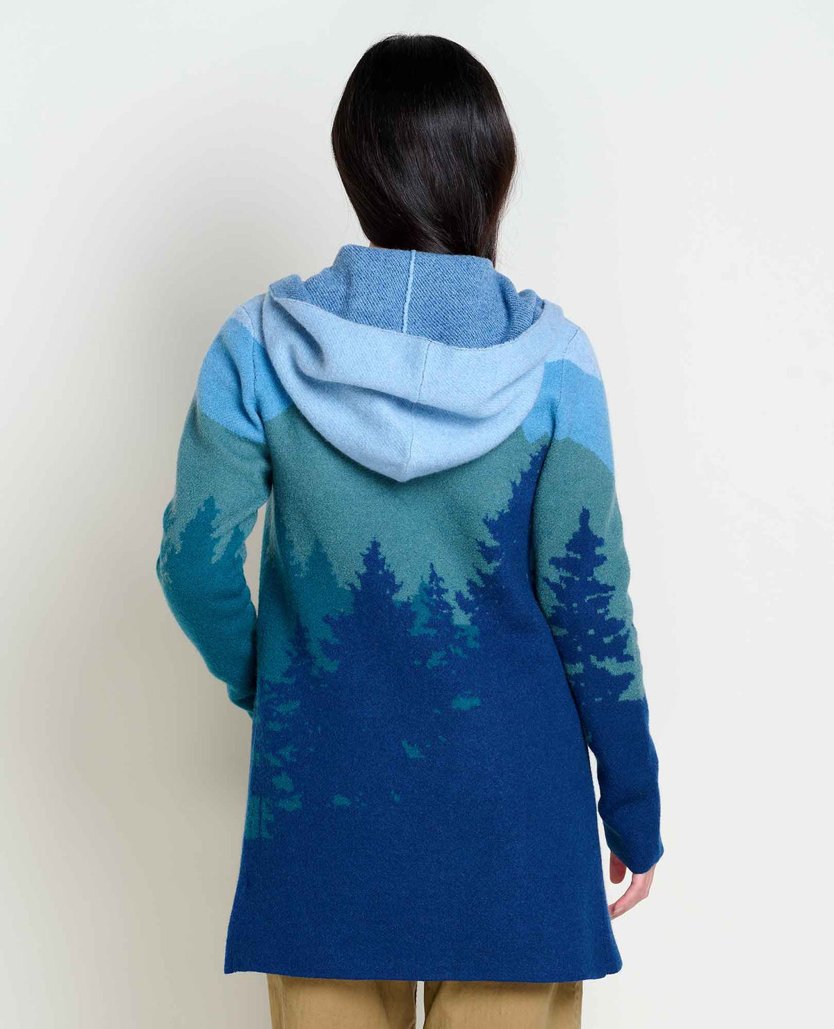 Women's Toad & Co Merino Wool Heartfelt Hoodie. Blue and green with sky and tree design.  Back view.