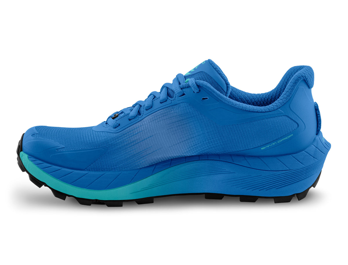 Women's Topo MTN Racer. Blue upper. Blue midsole. Medial view.