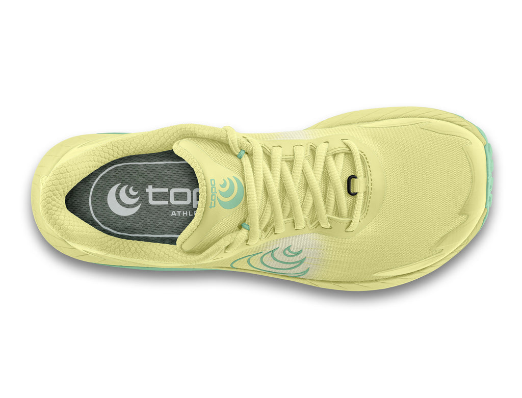 Women's Topo MTN Racer 4. Yellow upper. Yellow and green midsole. Green logo. Top view.