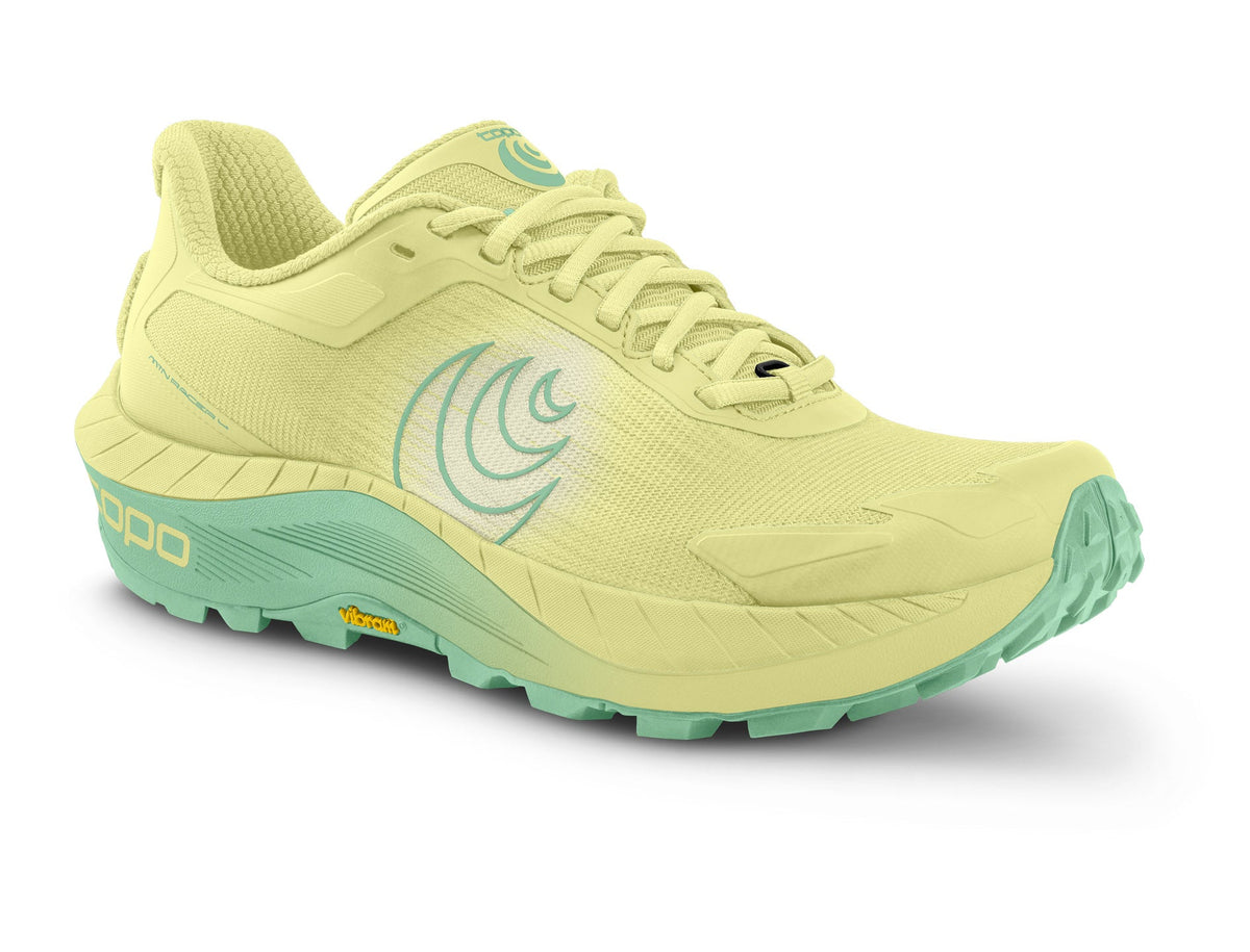 Women's Topo MTN Racer 4. Yellow upper. Yellow and green midsole. Green logo. Lateral view.