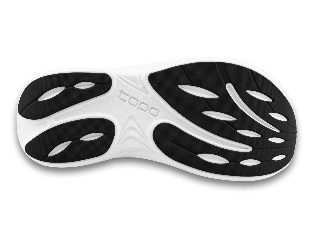 Women's Topo Atmos 2. Black upper. White midsole. Bottom view.