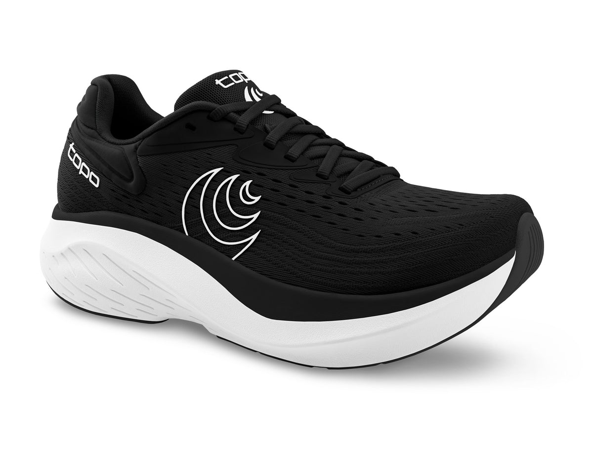 Women's Topo Atmos 2. Black upper. White midsole. Lateral view.